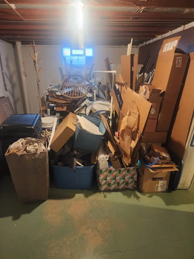 Roll-off dumpster container at job site for 4 Yard Dumpster Rental in Vinita